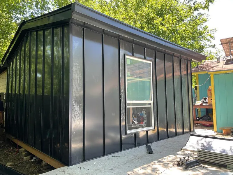 Black standing seam metal wall panels for Roof Inspection in Barberton